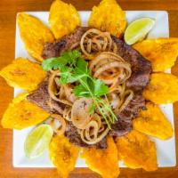  Steak Onions / Bistec Encebollado · comes with an order of fried plantains / Viene con una orden de tostones.