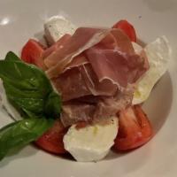 Caprese · buffalo mozzarella, basil, beefsteak tomatoes, extra virgin olive oil. Add prosciutto for an...