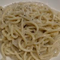 Cacio E Pepe · housemade tonnarelli pasta, granglona cheese,
parmigiano reggiano 36 month, black pepper
