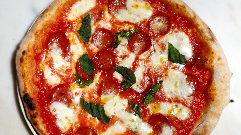 Diavola Pizza · San Marzano tomatoes, fior di latte mozzarella, spicy salame, extra virgin olive oil, basil.