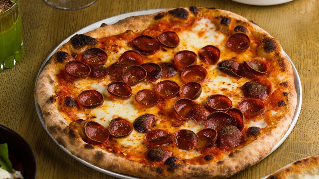 Sweet Spicy Pepperoni · Tomato sauce, mozzarella, pepperoni, Mike’s hot honey, and pickled Calabrian chiles.