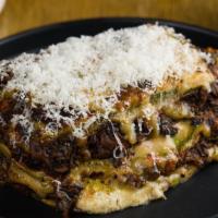Green Lasagna · Taleggio besciamella, mushroom bolognese, and mozzarella.