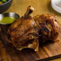 Rotisserie Herb Chicken · Green sauce.