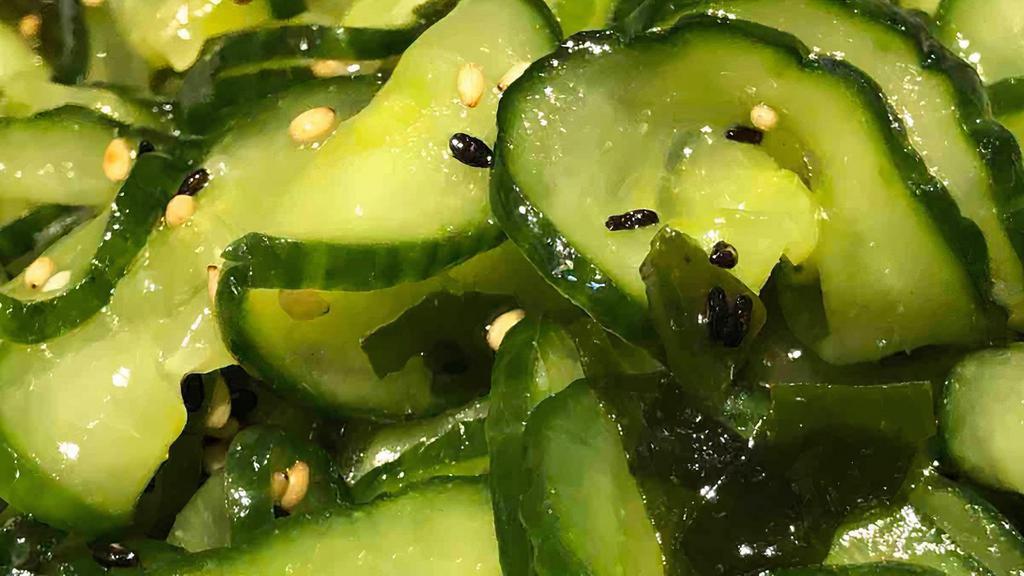 Cucumber+Wakame Salad · Sliced cucumber and wakame seaweed dressed with rice wine vinegar, sesame oil, sugar, and sea salt.