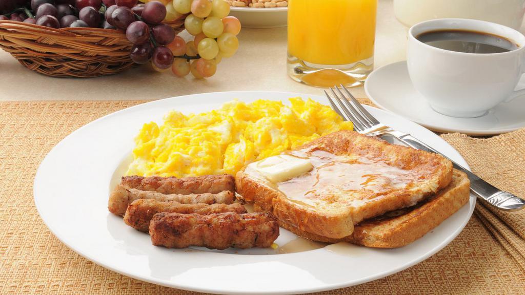 French Toast With Sausage And Eggs · Scrumptious french toast, eggs, and juicy sausage.