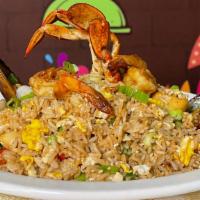 Chaufa De Carne Ó Pollo · Peruvian fried rice with scallions, red pepper, egg, and a choice of your favorite meat.