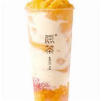 Mango Pomelo / 杨枝甘露 · Fresh Mango mixed with premium Green Tea blended into Slush, served with Mango Chunks, White...