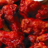 15 Wings (1 Dip) · Fresh jumbo party wings covered with your choice of our wing sauce. Served with bleu cheese ...