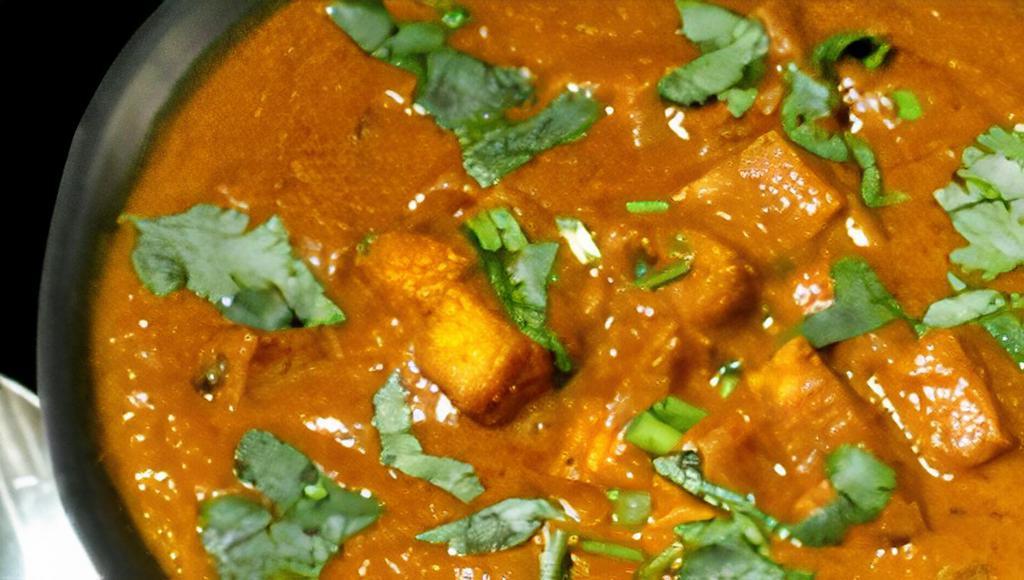 Curry Tofu · Fried curry powder tofu with curry sauce.
