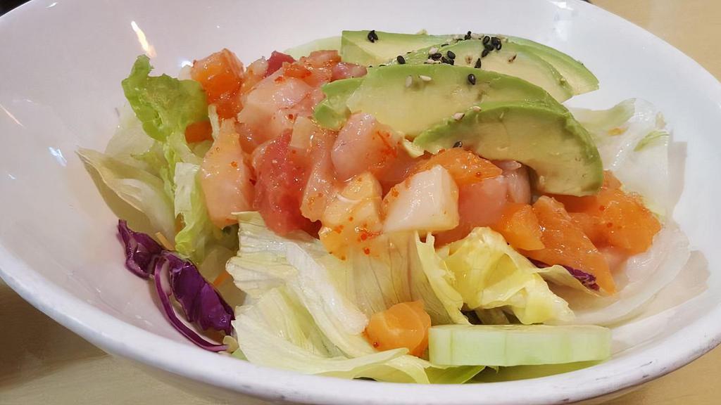 Sashimi Salad · Salmon, tuna, white tuna and avocado in special sauce.