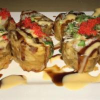 Blossom Roll · Snow crab, japanese mayo, avocado and asparagus wrapped with soybean paper. Deep fried and t...