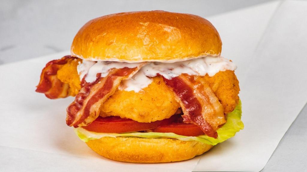 Chicken Bacon Ranch Sandwich · Grilled or Fried Chicken Breast, Served with Applewood Smoked Bacon, Buttermilk Ranch, Lettuce, Tomato, and your Favorite Flavor! 953-1,695 cal.