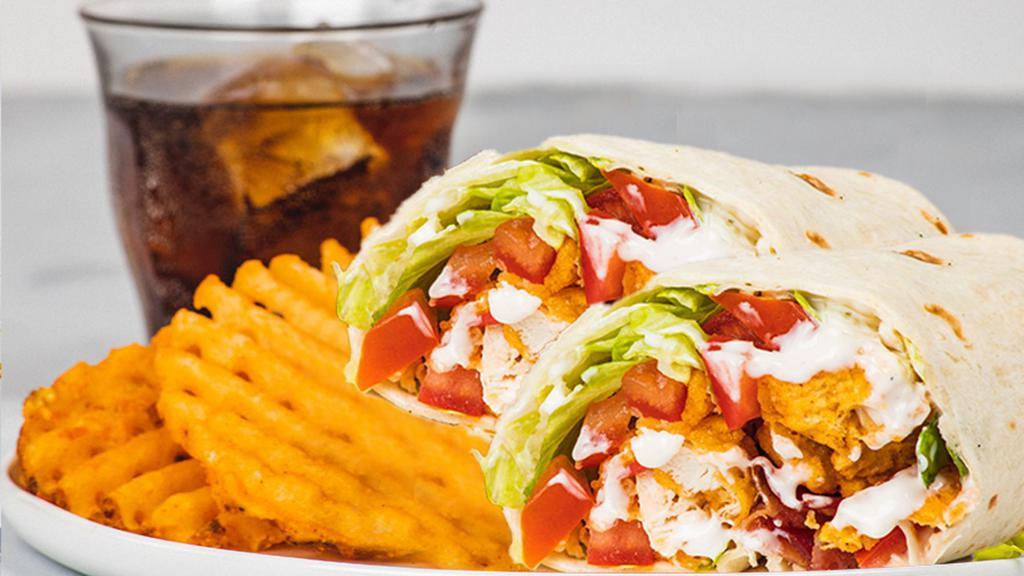 Chicken Bacon Ranch Wrap Meal · Grilled or Fried Chicken, Served with Applewood Smoked Bacon, Buttermilk Ranch, Lettuce, Tomato, your Favorite Flavor, Regular Waffle Fries, and a Drink! 1,098-2,666 cal.