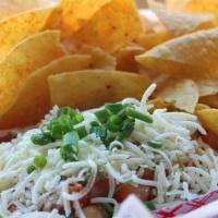 Chips & Pico · House-made corn tortilla chips with kimchi pico de gallo and shredded Cotija cheese. Great a...
