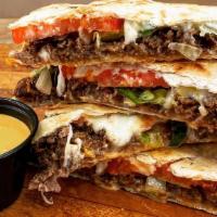 Ribeye Quesadilla · Served w/ choice of cheese & toppings on a flour tortilla.