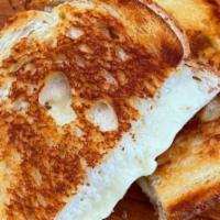 Grilled Cheese · Includes your choice of cheese, on hearty toasted sourdough bread.