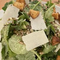 Baby Kale Caesar Salad · VEGETARIAN. GLUTEN FREE.
Toasted seeds, pecorino, Caesar dressing.