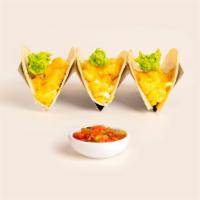 Vegetarian Breakfast Cheese Taco · A breakfast taco but with less meat. Scrambled eggs and salsa on a cheese filled taco tortil...
