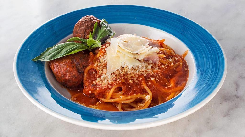 Spaghetti Polpette · Spaghetti with meatballs, tomato sauce and Parmigiano reggiano.