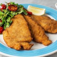 Pollo Alla Milanese · Deep fried organic chicken breast with arugula and cherry tomatoes and aurora sauce.