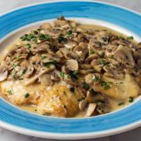 Scaloppine Di Pollo · Organic chicken breast with mushrooms in a white wine sauce.
