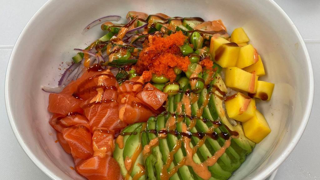 Salmon Lover · Sushi rice, salmon, fish roe, cucumber, avocado, edamame, mango, yumyum sauce, spicy mayo, eel sauce.