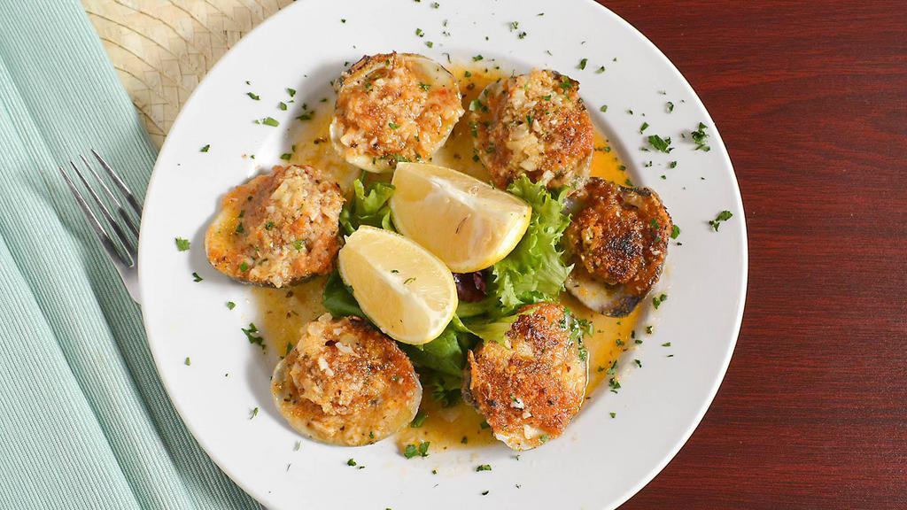 Clams Oreganato · 6 Pc whole littleneck clams shucked on the 1/2 shell, topped with a light bread crumb and baked the Italian way.