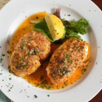 Crab Stuffed Sole · Local sole fillet stuffed generously, and baked in our garlic butter wine sauce and topped w...