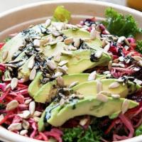 Kale & Hearty Salad · Marinated kale topped with avocado, cabbage, carrots, beets, and sunflower seeds with house ...
