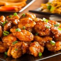 Orange Chicken · Spicy. Lightly breaded chicken chunks, stir-fried in house orange sauce.