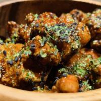 Popcorn Chicken · Boneless Fried Chicken, Sweet gochujang glaze sauce and Black sesame.