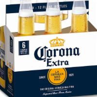 Corona Extra (12 Oz. Bottle) · Served cold.