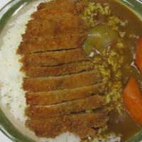 Chicken Katsu Curry Rice · Chicken katsu, golden curry sauce, carrot on white rice.