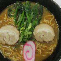 Miso Ramen · Miso base in soup with two pieces char siu, one piece fish cake, choy sum, green onion.