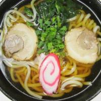 Shoyu Udon · Shoyu base in soup with two pieces char siu, one piece fish cake, choy sum, green onion.