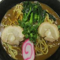 Curry Ramen · Mild spicy. Golden curry sauce in soup with two pieces char siu, one piece fish cake, choy s...