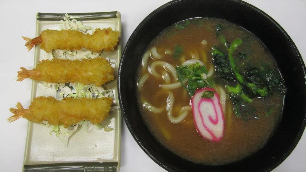 Shrimp Tempura Udon · Shoyu base in soup with three pieces of shrimp tempura, one piece fish cake, choy sum, green onion.