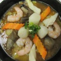 Seafood Ramen · Shoyu base in soup with shrimp, scallop, squid, mushroom, carrot, ground onion, cabbage, gre...