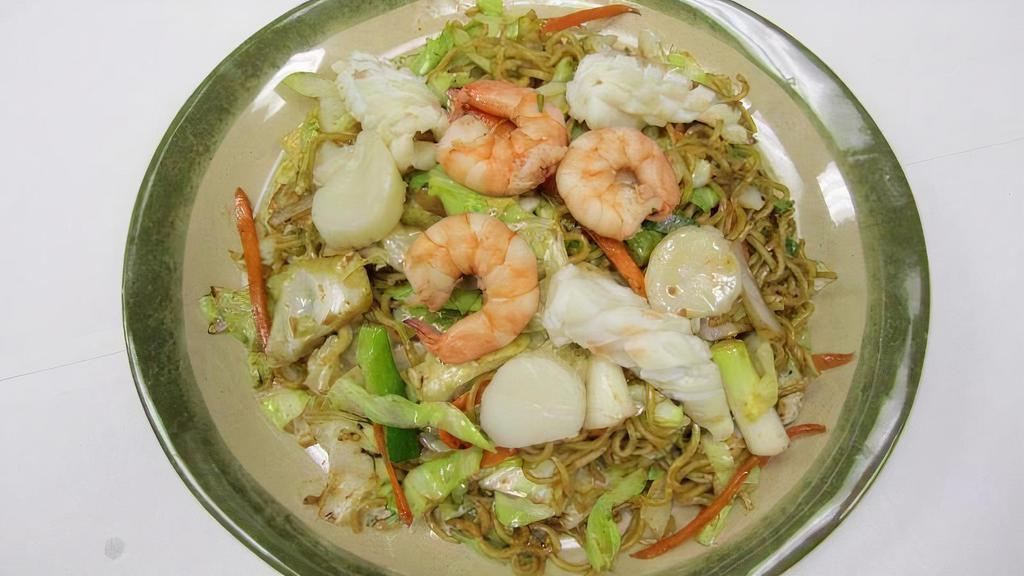 Seafood Fried Noodle · Yakisoba sauce with shrimp, scallop, squid, carrot, ground onion, cabbage, green onion stir-fried.