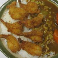 Shrimp Katsu Curry Rice · Shrimp katsu, golden curry sauce, carrot on white rice.