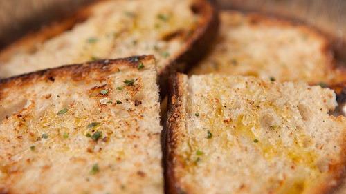 Fettunta · Grilled bread rubbed with fresh garlic and doused in sicilian extra virgin olive oil