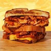 Bbq Chicken Grilled Cheese · Melted cheddar and jack cheese, chicken, caramelized onions, and BBQ sauce between two slice...