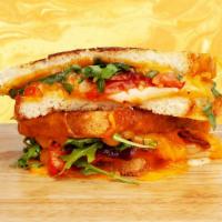 Blt Grilled Cheese · Melted cheddar, crisp bacon, lettuce, tomato, and mayo between two slices of buttery grilled...