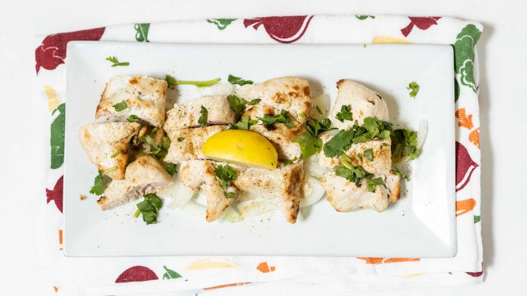 Malai Chicken · Mildly spiced and cream marinated white meat roasted in a clay oven.