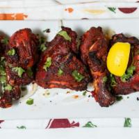 Tandoori Chicken Legs · Chicken marinated in ginger and spices.
If you like white meat please pick CHICKEN TKKA