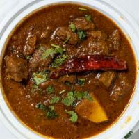 Lamb Vindaloo · Spicy. Goan style extremely spicy curry.