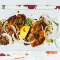 Tilapia Grill · Chilie, tamarind and spice rubbed fillet.