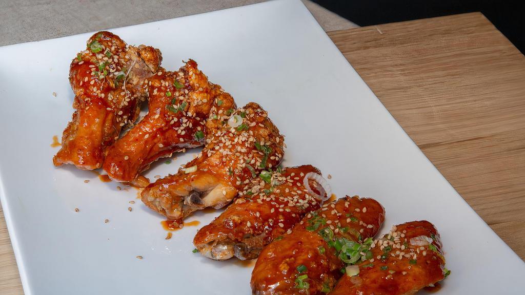 Spicy Chicken Wings · Sesame, scallion, homemade spicy miso sauce.