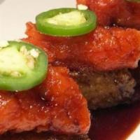 Crispy Rice Spicy Tuna · 4 pcs. Spice tuna over butter seared rice, jalapeño, and sweet soy sauce