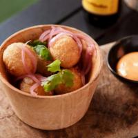 Yuca Tots · Yuca tater tots. Served with chipotle aioli.